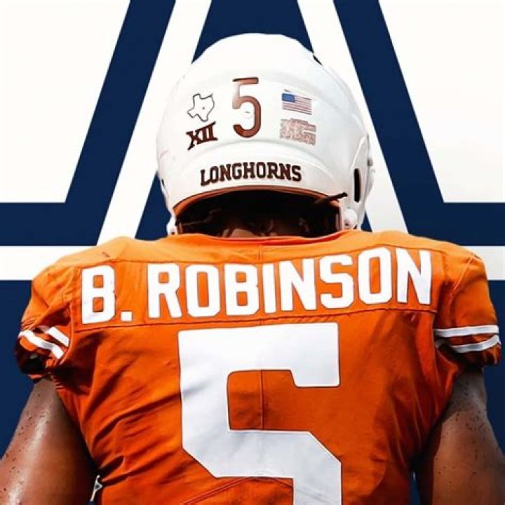 
Longhorns RB Bijan Robinson Parents LaMore Sauls And Lamont Sauls 